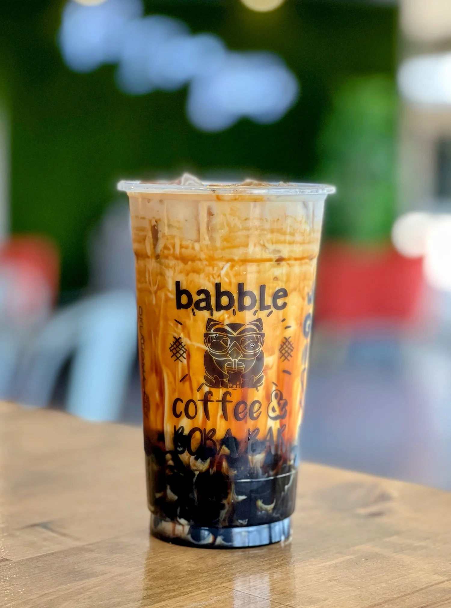 Boba milk tea with tapioca pearls in a Babble cup